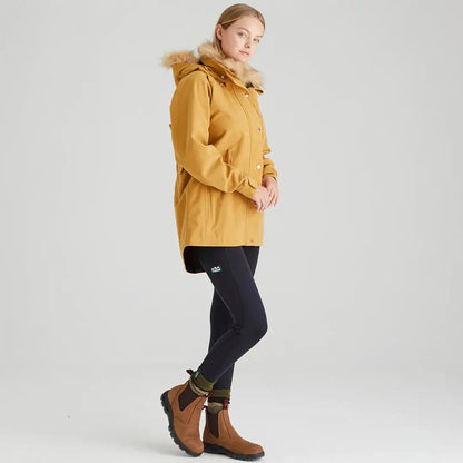 Woman wearing yellow Ridgeline Ladies Monsoon Nordic Jacket with fur-trimmed hood