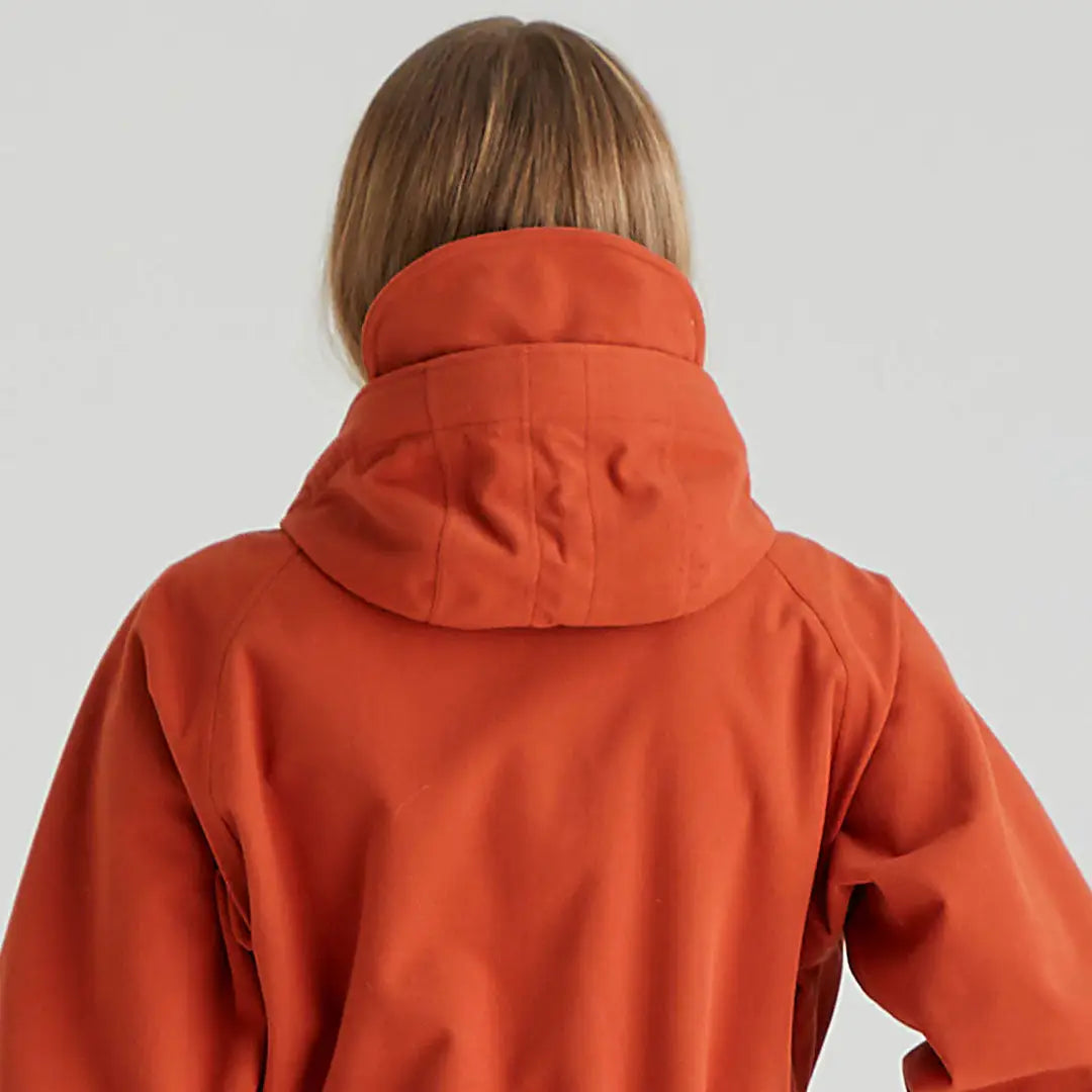 Orange hooded jacket from Ridgeline Ladies Monsoon Nordic Smock, perfect for chilly days