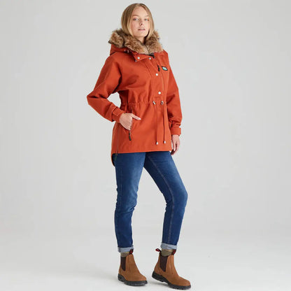 Woman wearing orange Ridgeline Ladies Monsoon Nordic Smock with fur-trimmed hood
