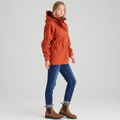 Woman wearing orange hooded jacket in Ridgeline Ladies Monsoon Nordic Smock