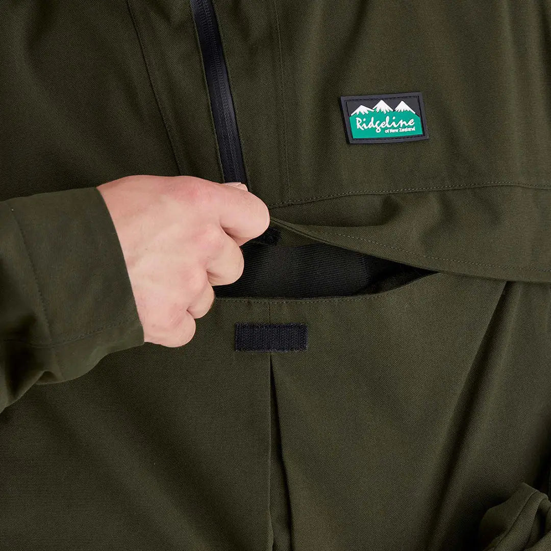 Olive green Cambrian Smock men’s country clothing with a pocket for hunting trips
