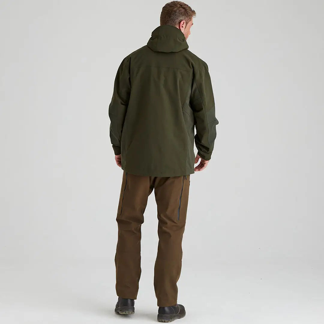 Man in green Cambrian Smock and brown pants, perfect country clothing for hunting