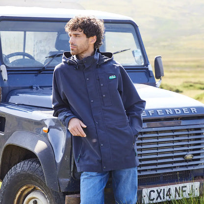 Man wearing navy Ridgeline Mens Monsoon Classic Waterproof Jacket outdoor style