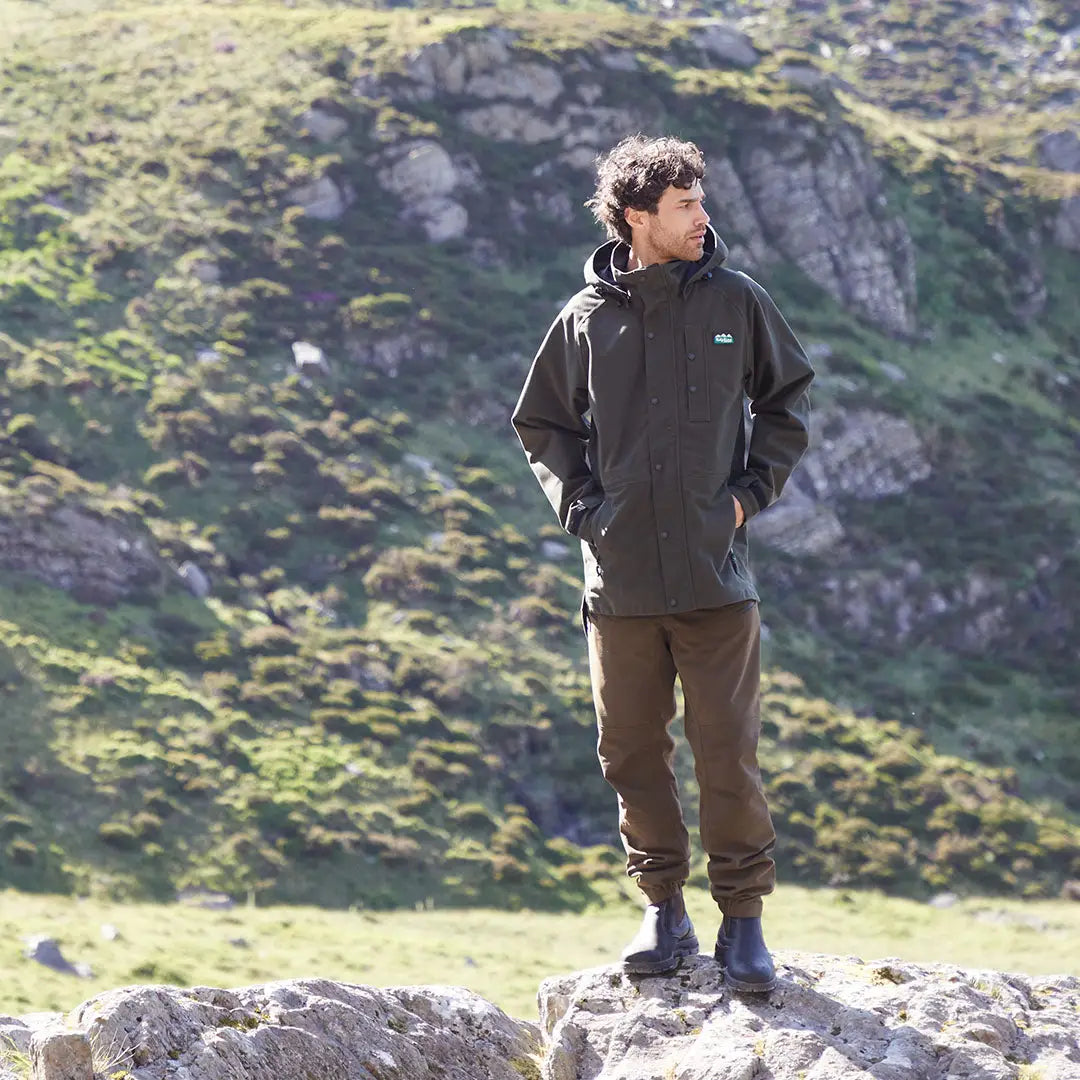 Man wearing Ridgeline Mens Monsoon Classic Waterproof Jacket outdoors