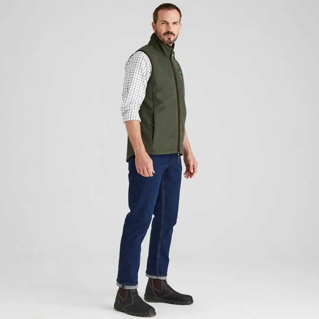 Man wearing a green Ridgeline Monarch Gilet for outdoor adventures