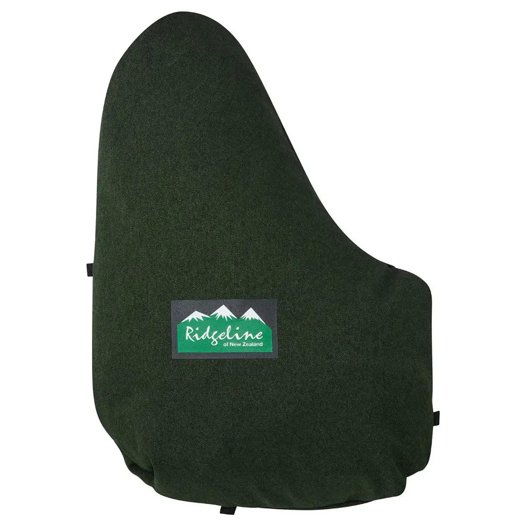 Dark green rifle case with Ridgeline Monsoon Light Smock for outdoor adventures