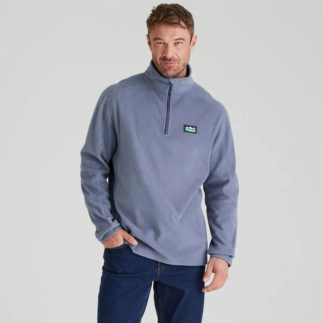Man wearing Ridgeline Narvik Fleece in blue, made from functional polyester fleece