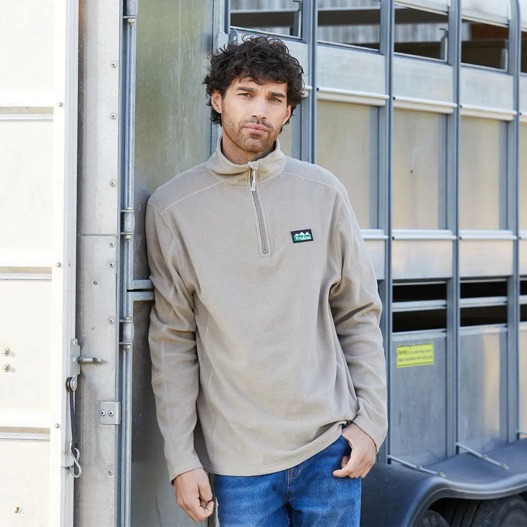 Man wearing Ridgeline Narvik Fleece in tan, stylish functional polyester fleece