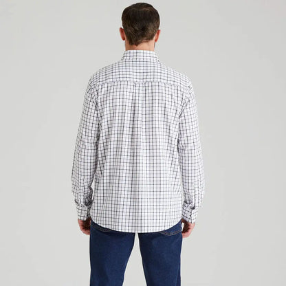 Man wearing a checkered Ridgeline Sedgebrook Shirt showing off style and comfort