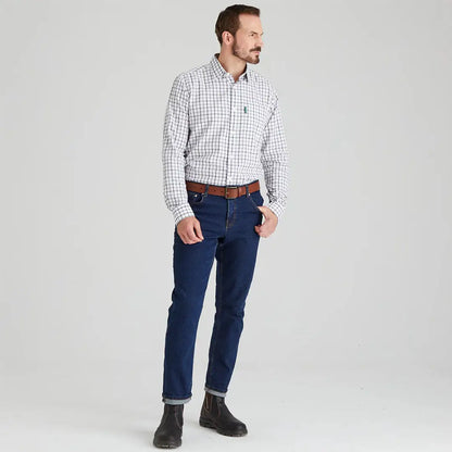 Man in a checkered Ridgeline Sedgebrook Shirt and jeans for casual style