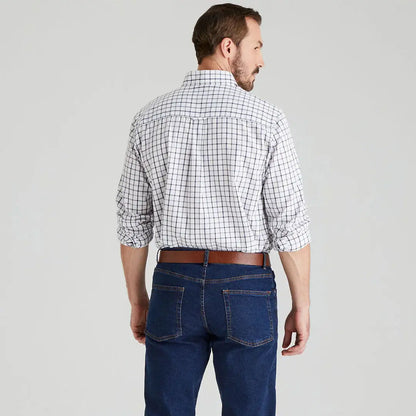 Man wearing Ridgeline Sedgebrook Shirt in plaid and jeans showcasing style