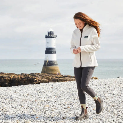 Woman wearing the Ridgeline Womens Brenna Fleece Jacket, perfect for country clothing and hunting adventures