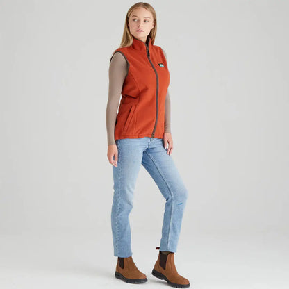 Woman’s rust-colored zip-up vest from Ridgeline’s exceptionally advanced Kodiak Gilet collection