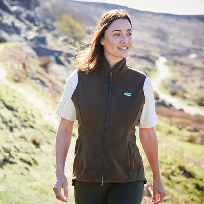 Woman’s brown fleece vest from Ridgeline Womens Kodiak Gilet, a luxurious southern star wind-resistant vest perfect for layering