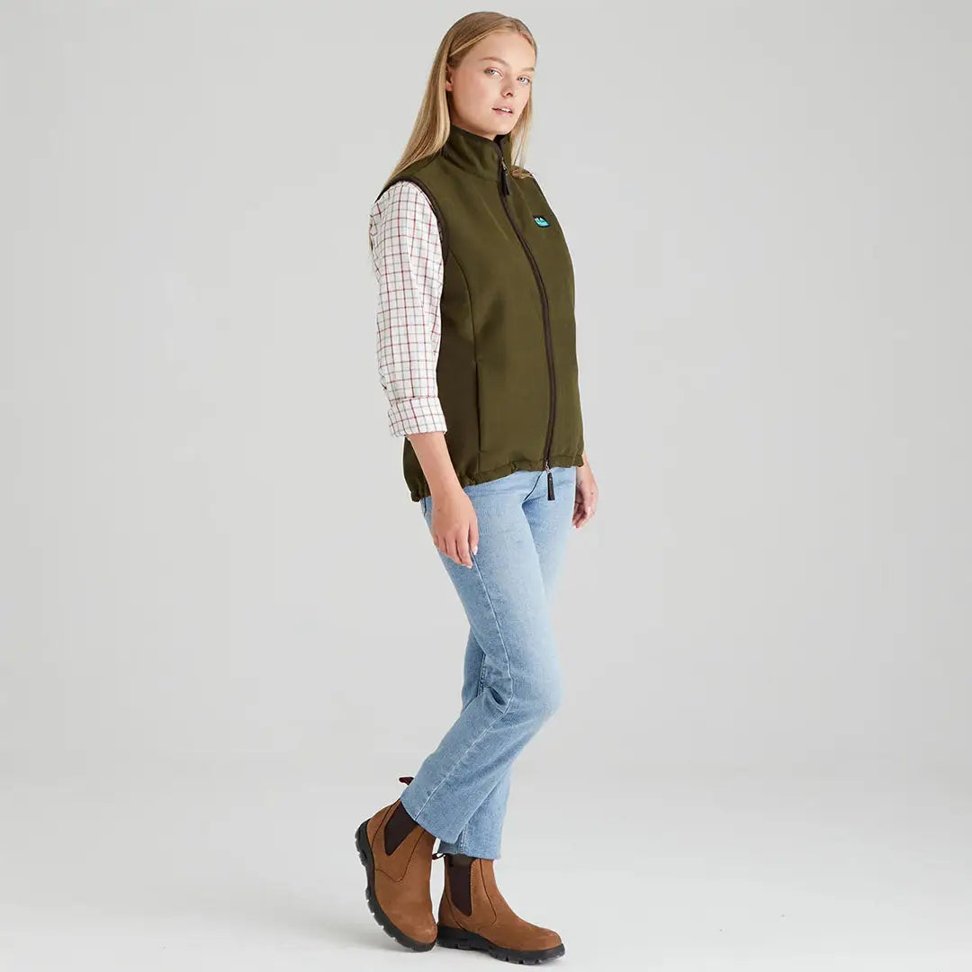 Woman’s olive green vest from Ridgeline’s Monarch Gilet collection