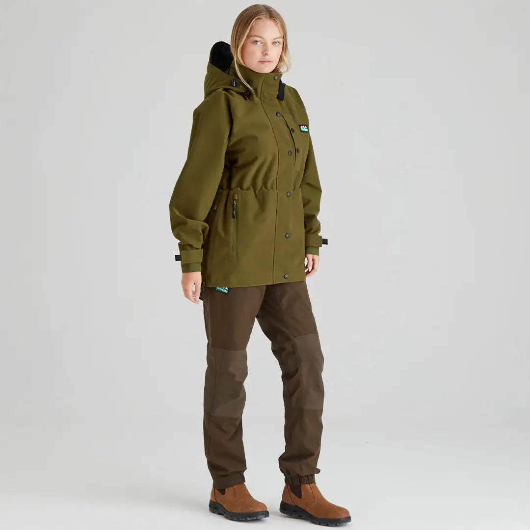 Olive green Ridgeline Womens Monsoon Classic Jacket with brown pants for outdoor style