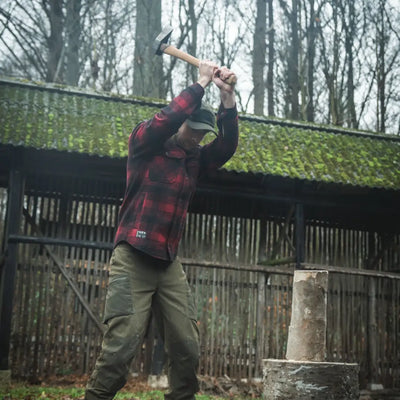 Man swinging hammer wearing the Seeland Canada Yukon Shirt in Yukon style