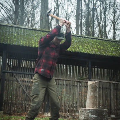 Man swinging hammer wearing the Seeland Canada Yukon Shirt in Yukon style
