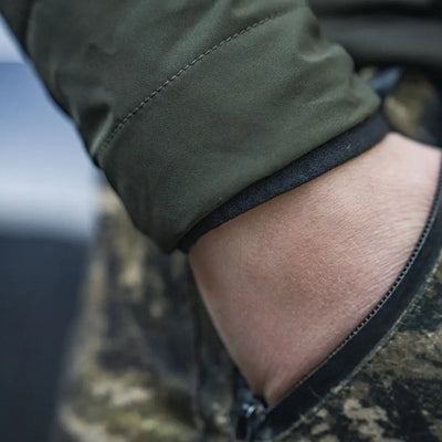 Camouflage jacket sleeve from Seeland Celsius Aia Womens Heat Jacket for outdoor warmth