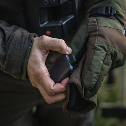Person holding Seeland Celsius Heat Gloves electronic heat gloves for warmth and tech warmth