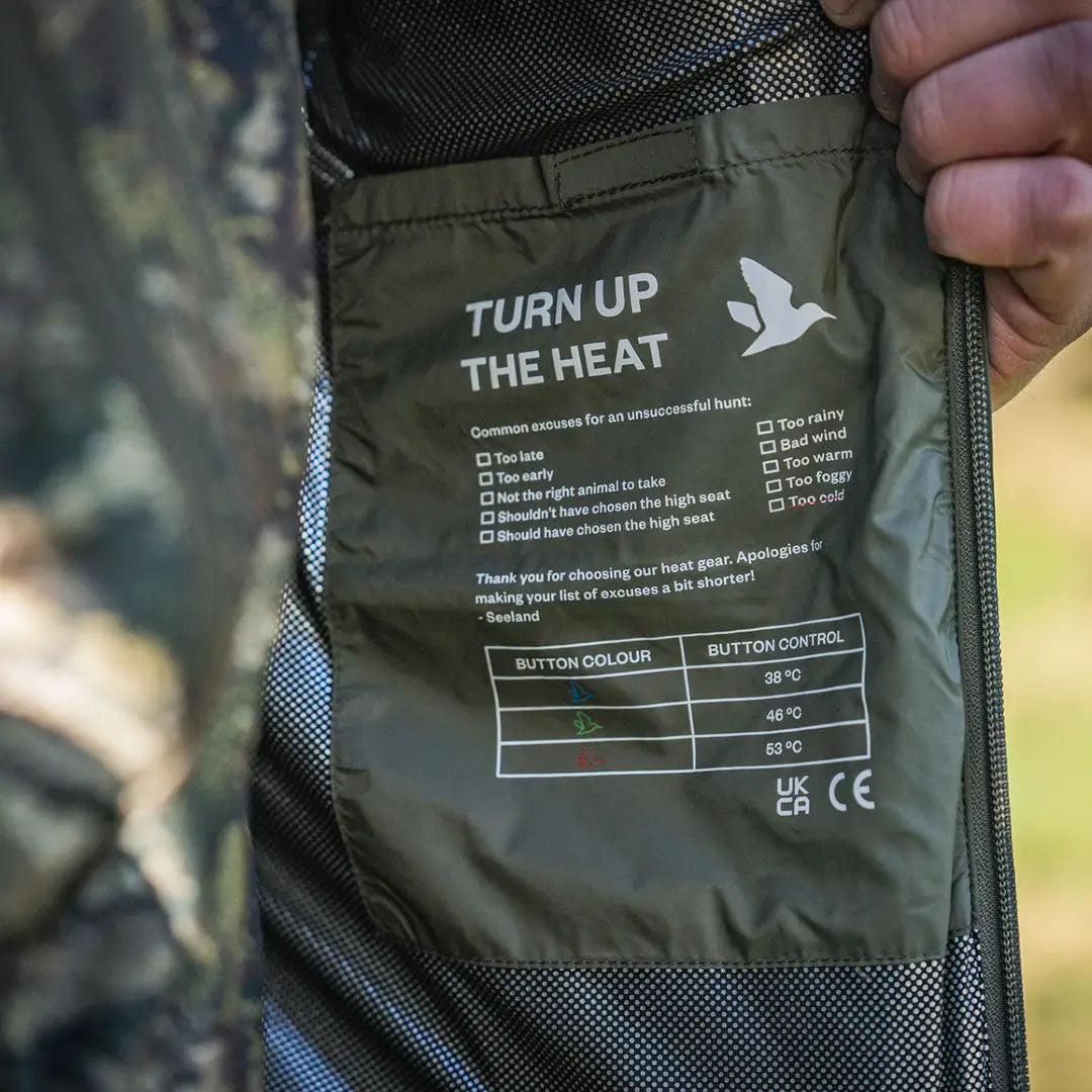 Jacket interior pocket with heating control instructions for Seeland Celsius Heat Liner Waistcoat