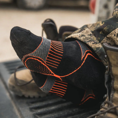 Black sock with orange accents from Seeland Field Coolmax Sock 2 Pack for hunting