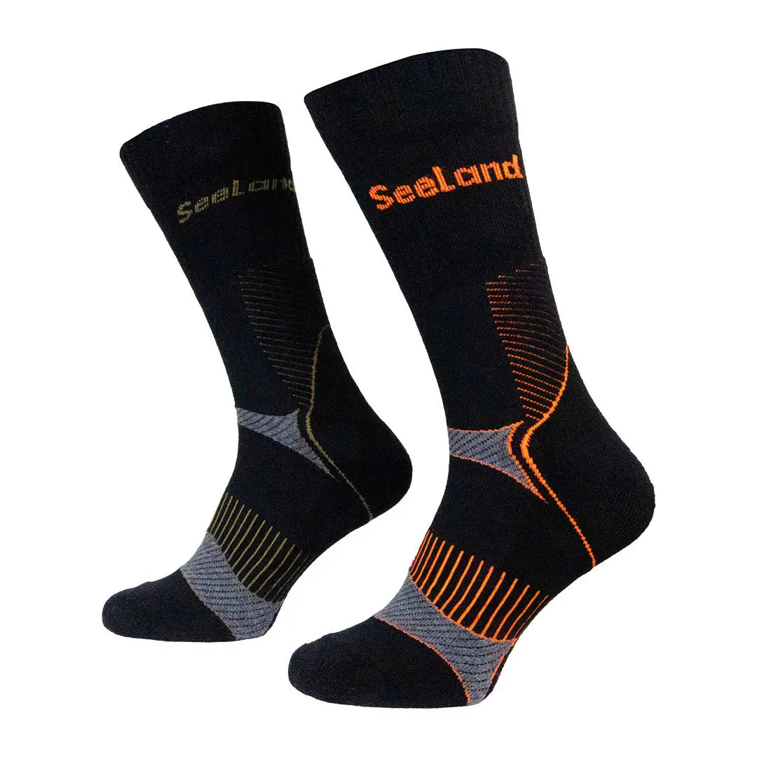 Pair of black Seeland Field Coolmax Socks with orange and yellow accents for hunting or country clothing