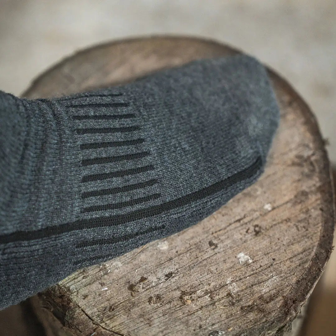 Gray sock with black stripes from Seeland Field Heavy Merino Socks for durable outdoor wear