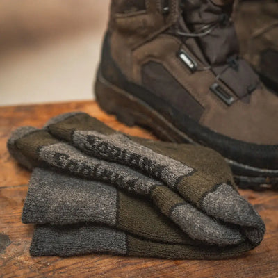 Folded Seeland Field Thermo Socks in gray and green for ultimate warmth and comfort