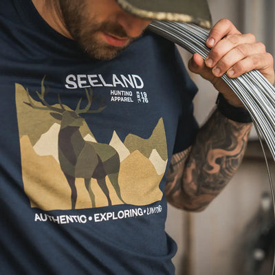 Navy Seeland Fragment T-Shirt featuring a deer and mountain graphic for outdoors lovers