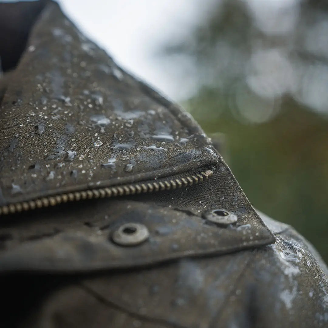 Water-spotted black Seeland Highpoint Jacket, perfect for country clothing and hunting