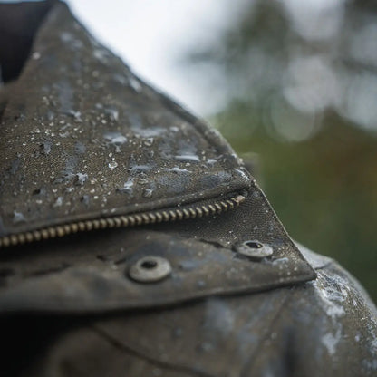 Water-spotted black Seeland Highpoint Jacket, perfect for country clothing and hunting