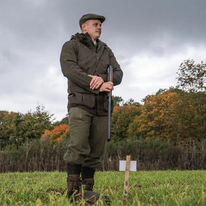 Hunter in field wearing Seeland Highpoint Jacket, ideal country clothing for hunting
