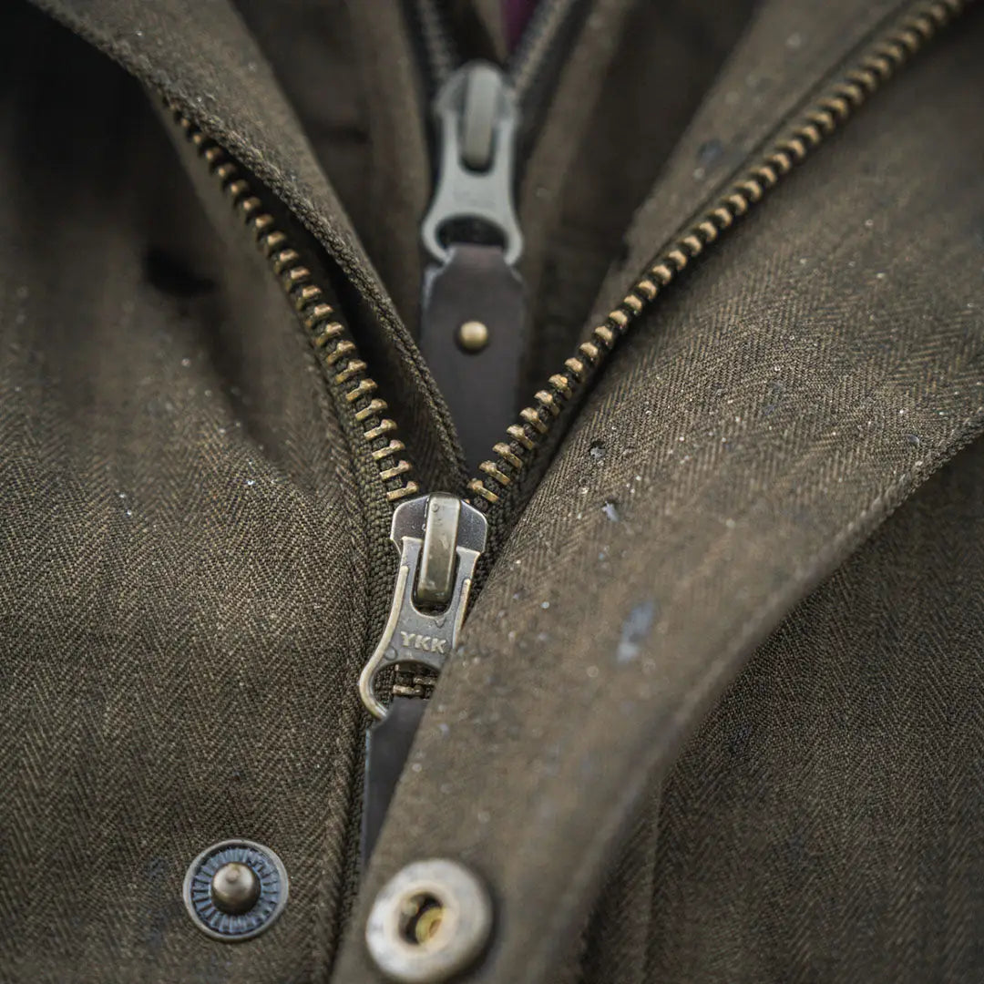 Olive green Seeland Highpoint Jacket with brass zippers, perfect for country hunting style