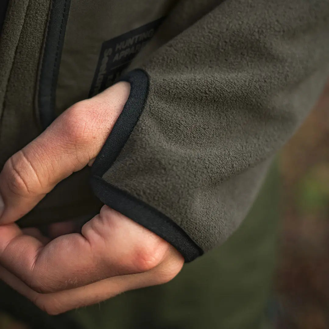 Olive green Rogue Solid Reversible Fleece Jacket sleeve with thumb hole for reversible fleece style