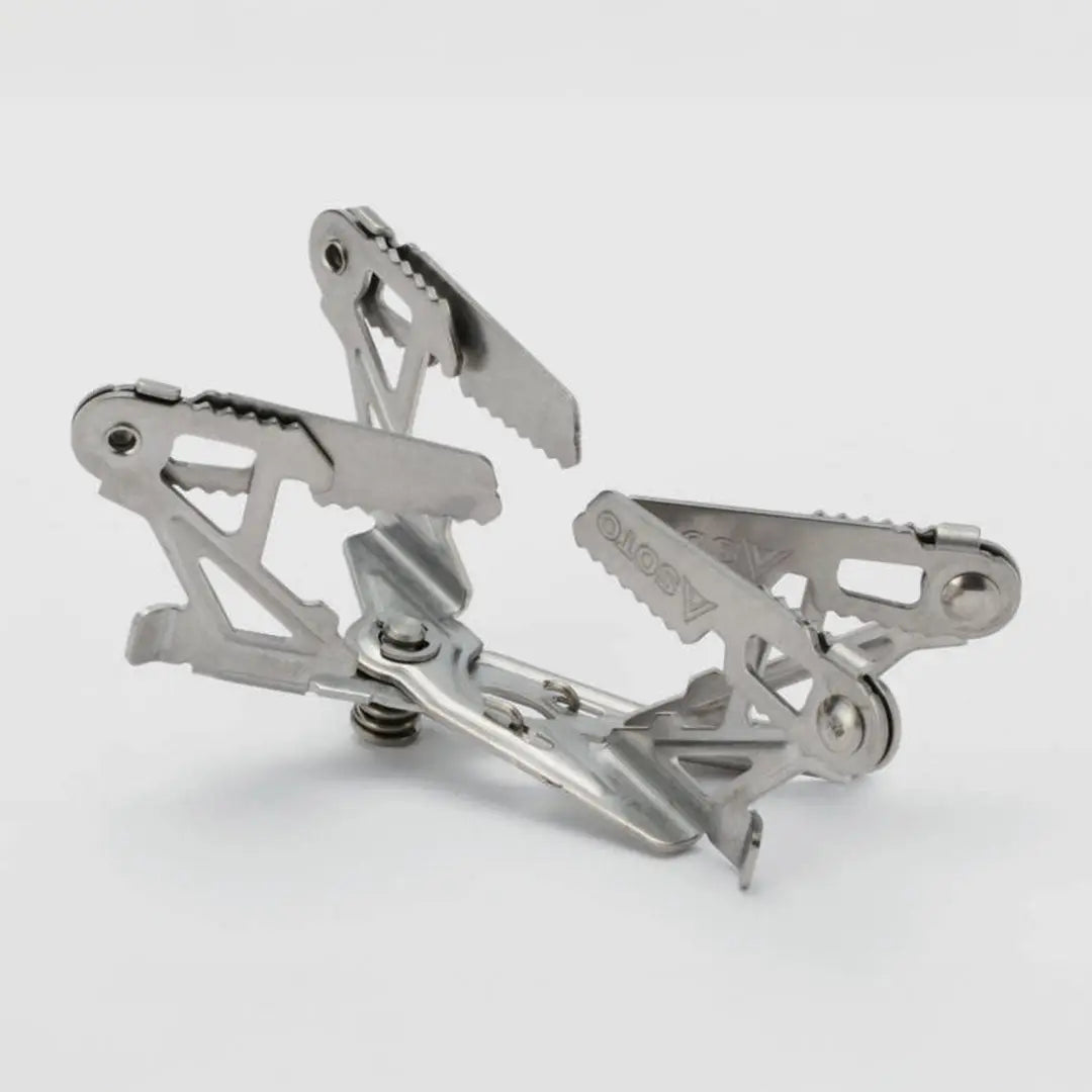 Silver metal pot stand for Soto Windmaster, perfect for outdoor cooking adventures