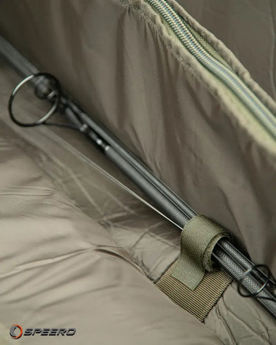 Fishing rods secured inside Speero 5/6 Rod Holdall with fully padded double-zippered main compartment