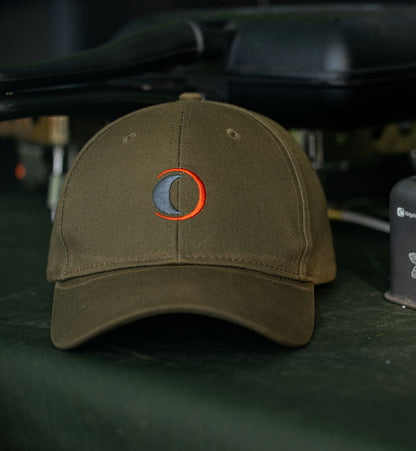 Olive-green Speero Baseball Cap featuring a stylish crescent-moon logo
