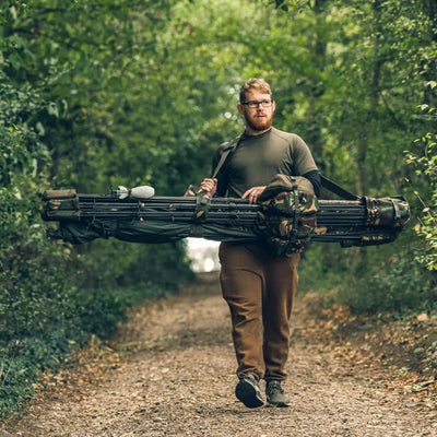 Futuristic rifle design with multiple barrels on Speero Compact Rod Sling setup