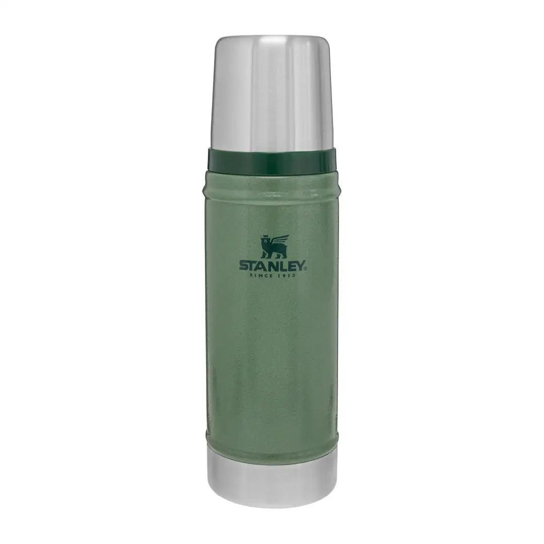 Green and silver Stanley Classic vacuum flask for hunting gear