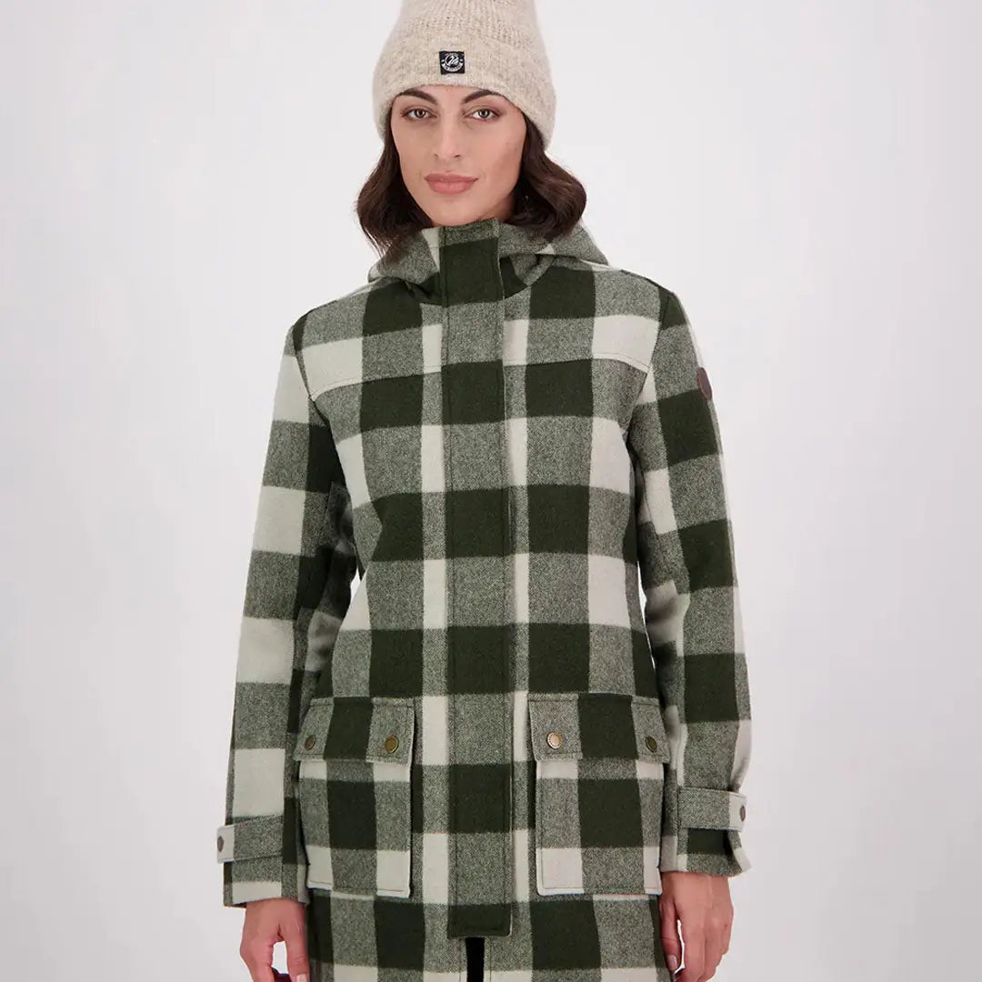 Woman in Swanndri Annmore merino wool overcoat with dark green and off-white plaid
