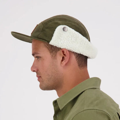 Olive green Swanndri Birchwood Sherpa lined cap with cream sherpa ear flaps for cozy style