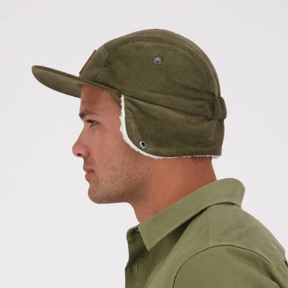 Olive green Swanndri Birchwood Sherpa lined trapper hat with white sherpa lining
