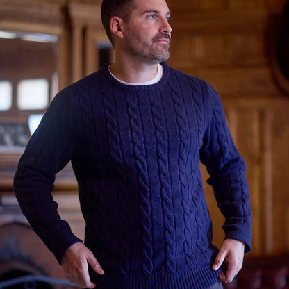 Men’s navy blue cable knit sweater from Swanndri Doncaster Mens with white crew-neck undershirt