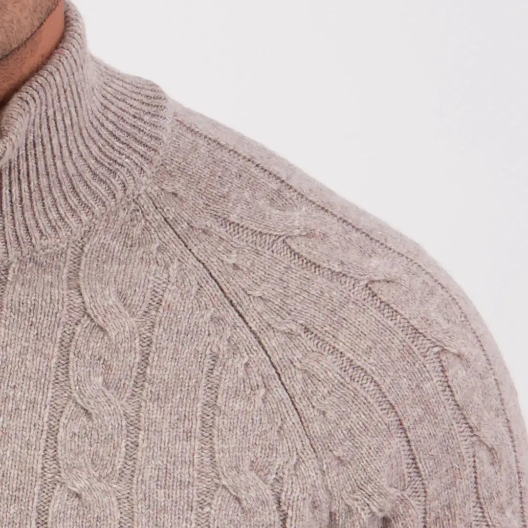 Close-up of Swanndri Doncaster V2 Zip Cable Knit sweater with beige ribbed mock neck