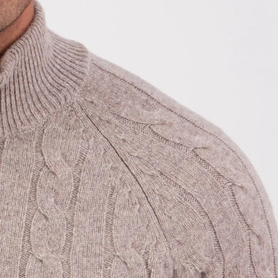 Close-up of Swanndri Doncaster V2 Zip Cable Knit sweater with beige ribbed mock neck