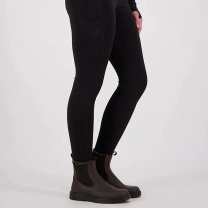 Person wearing black Swanndri High Rock Womens Legging with dark brown Chelsea boots