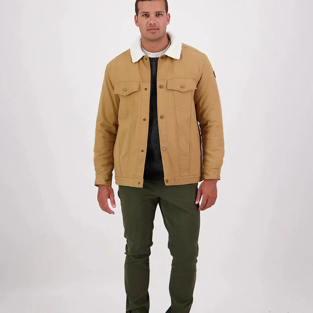 Men’s tan Swanndri Kaituna Mens Canvas Jacket with white fleece collar for a rugged look