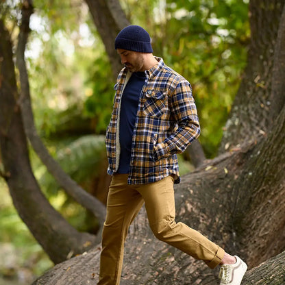 Men’s plaid flannel jacket with navy blue swanndri newton beanie and khaki pants