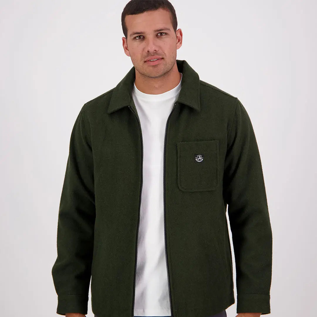 Men’s dark green Swanndri Northgate Shacket with collar, zip-up style, chest pocket